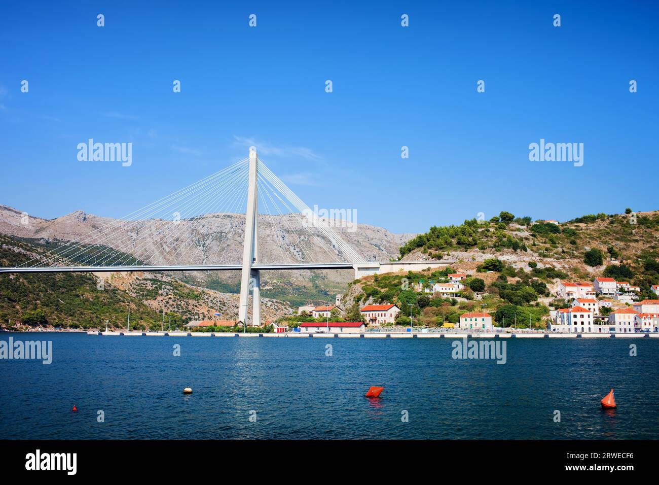 Franjo Tudjman Bridge at the entrance to Dubrovnik from western side in tranquil scenery of the Adriatic Sea coastline in Croatia, Dalmatia County Stock Photo