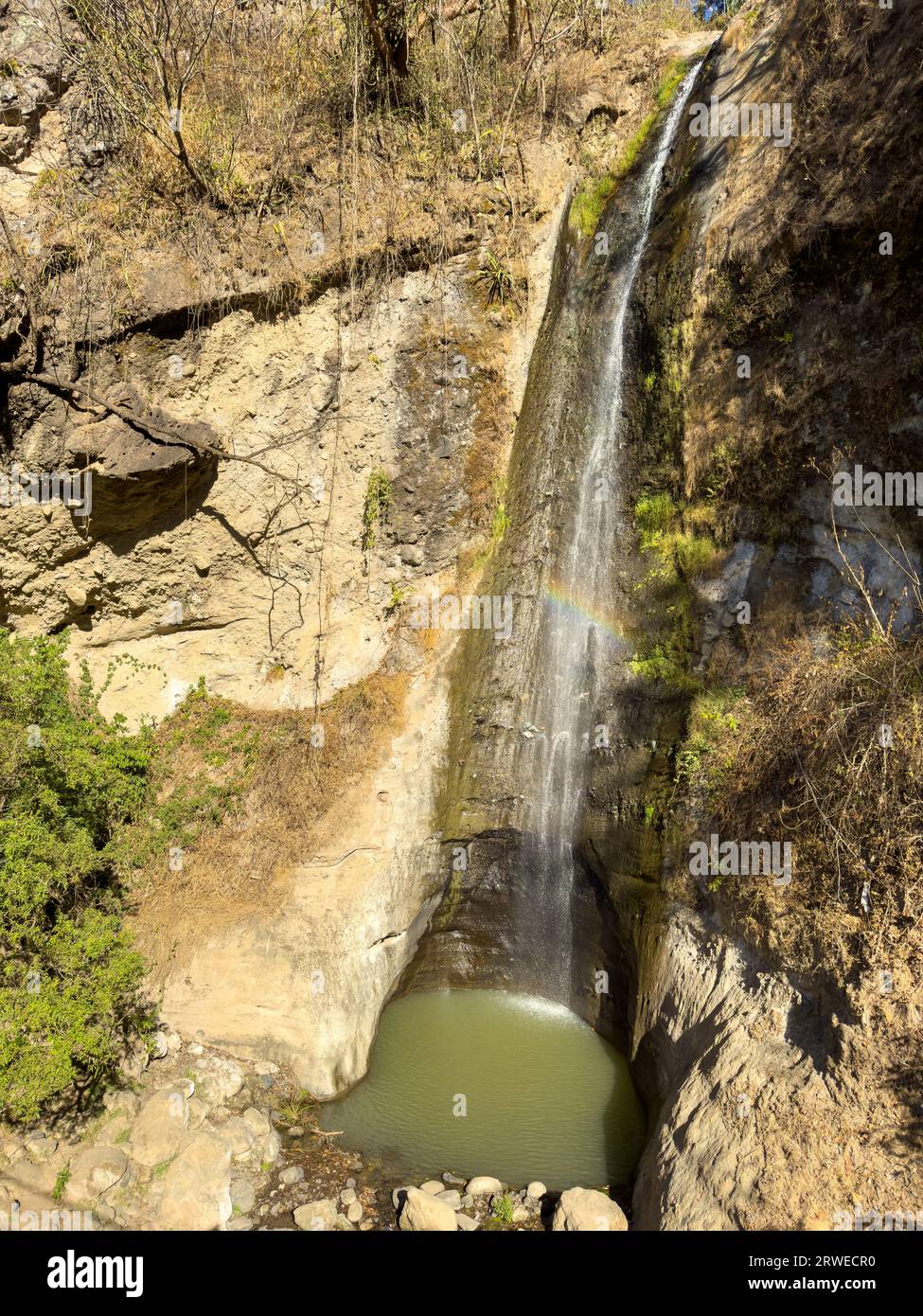 Waterfall with rainbow near Panajachel on Lake Atitlan Guatemala Stock Photo
