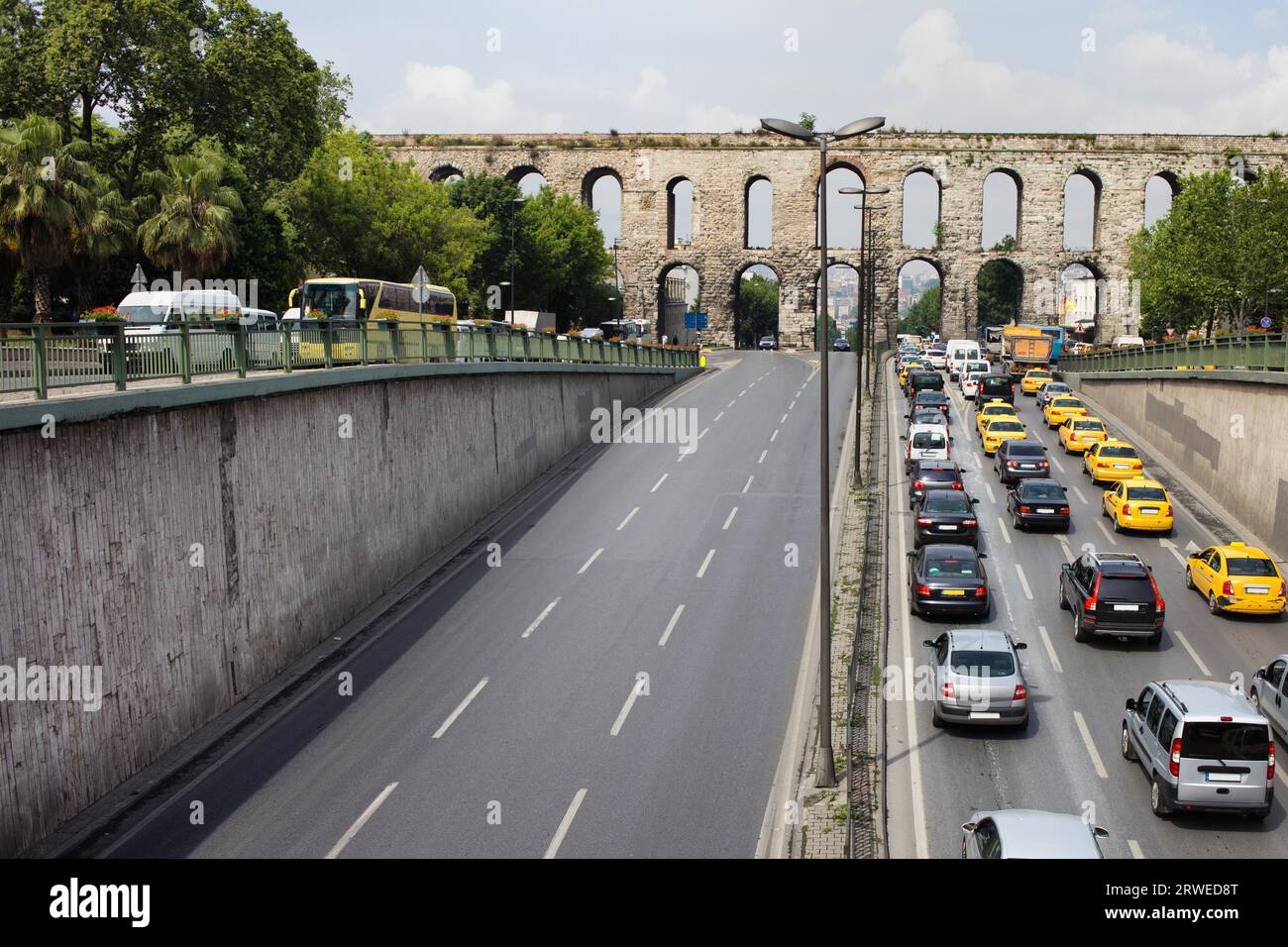 Cars on Ataturk Boulevard and Valens Aqueduct in Istanbul, Turkey Stock Photo