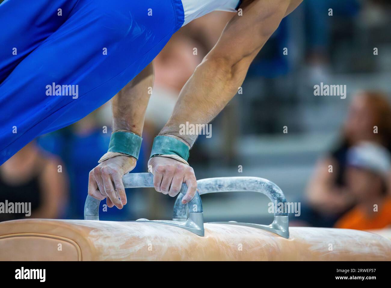 Symbol image of apparatus gymnastics: Close-up of an apparatus gymnast on the pommel horse Stock Photo