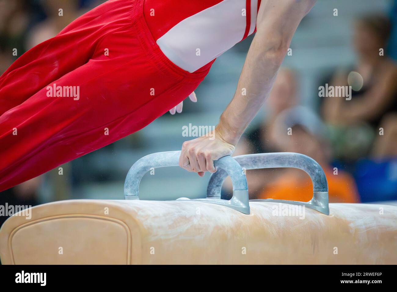 Symbol image of apparatus gymnastics Closeup of an apparatus gymnast