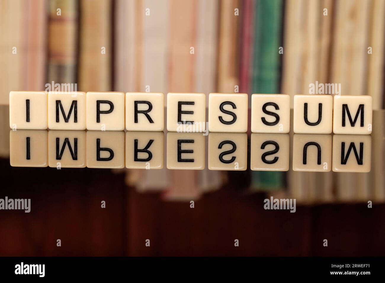 The german word in the IMPRESSUM (Imprint) written with letter cubes in