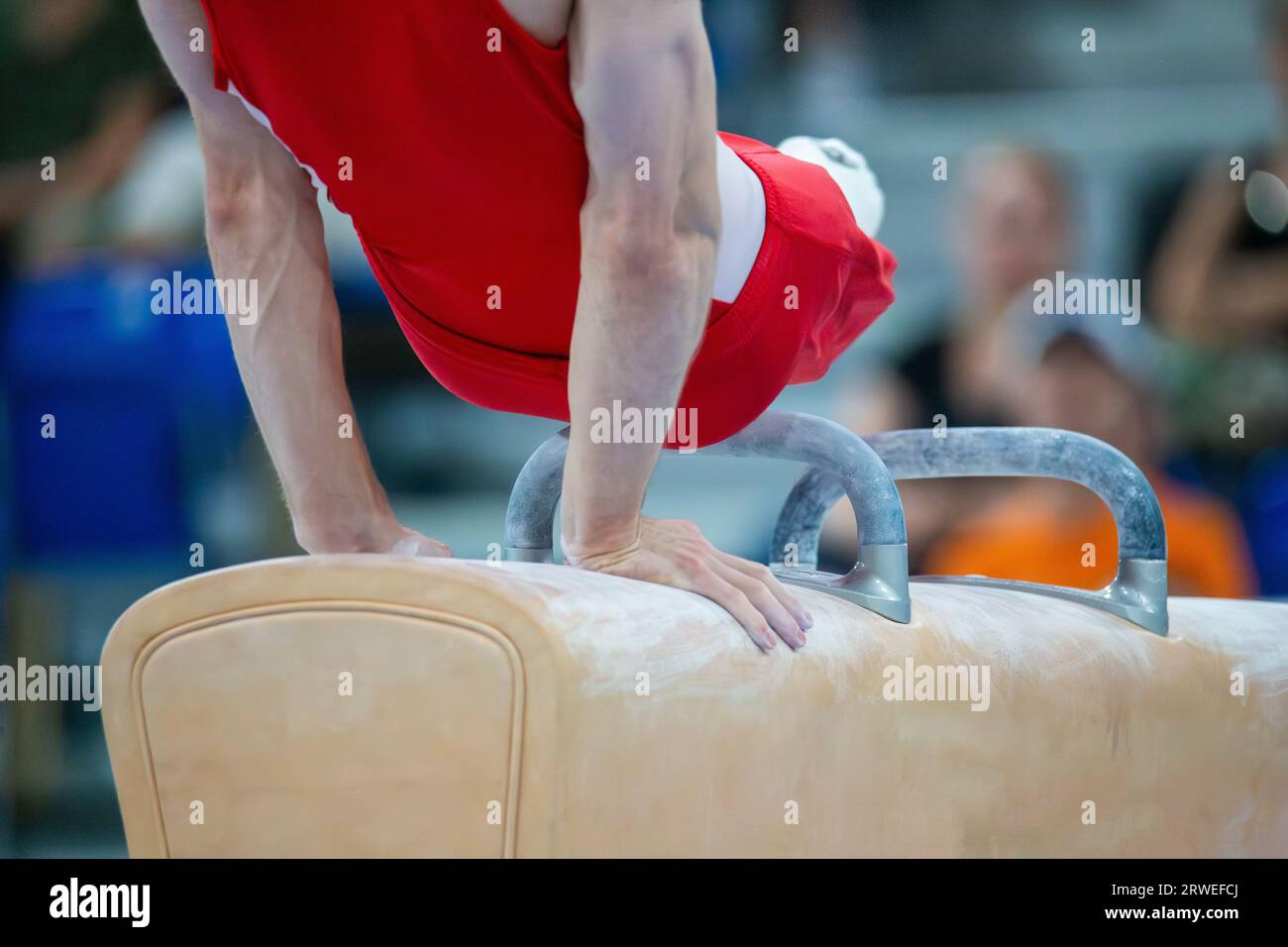Symbol image of apparatus gymnastics Closeup of an apparatus gymnast