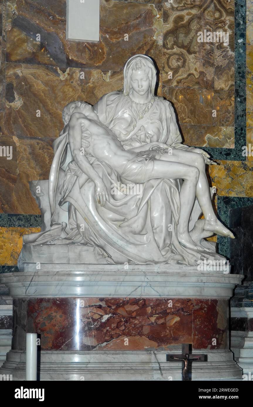 Frontal view of marble sculpture Sculpture in white marble from Carrara Pieta by Michelangelo Mary Mother of God mourns holds son, St. Peter's Stock Photo