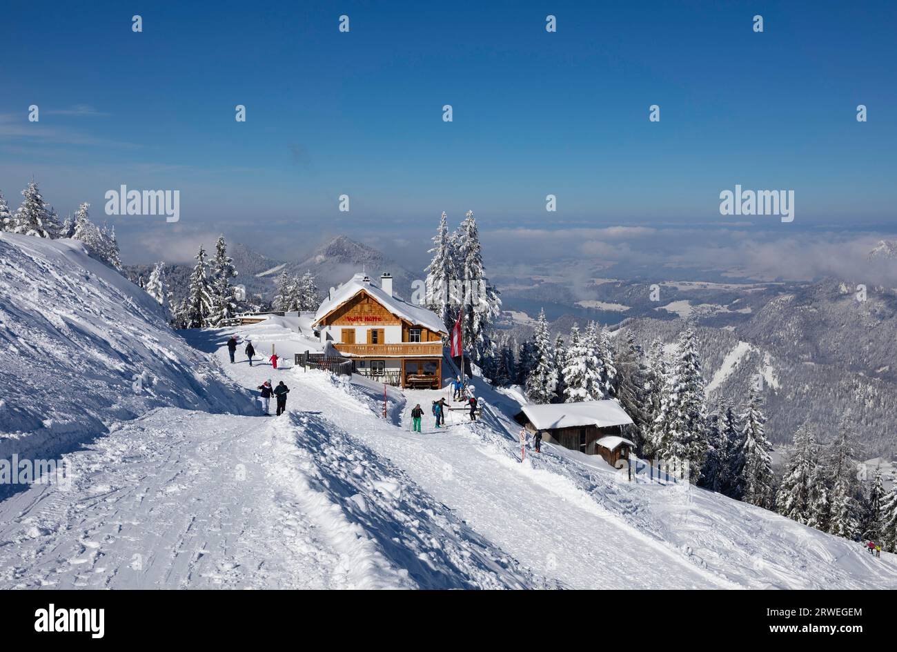 Winter landscape with ski tourers and alpine hut at Zwoelferhorn, Sankt ...