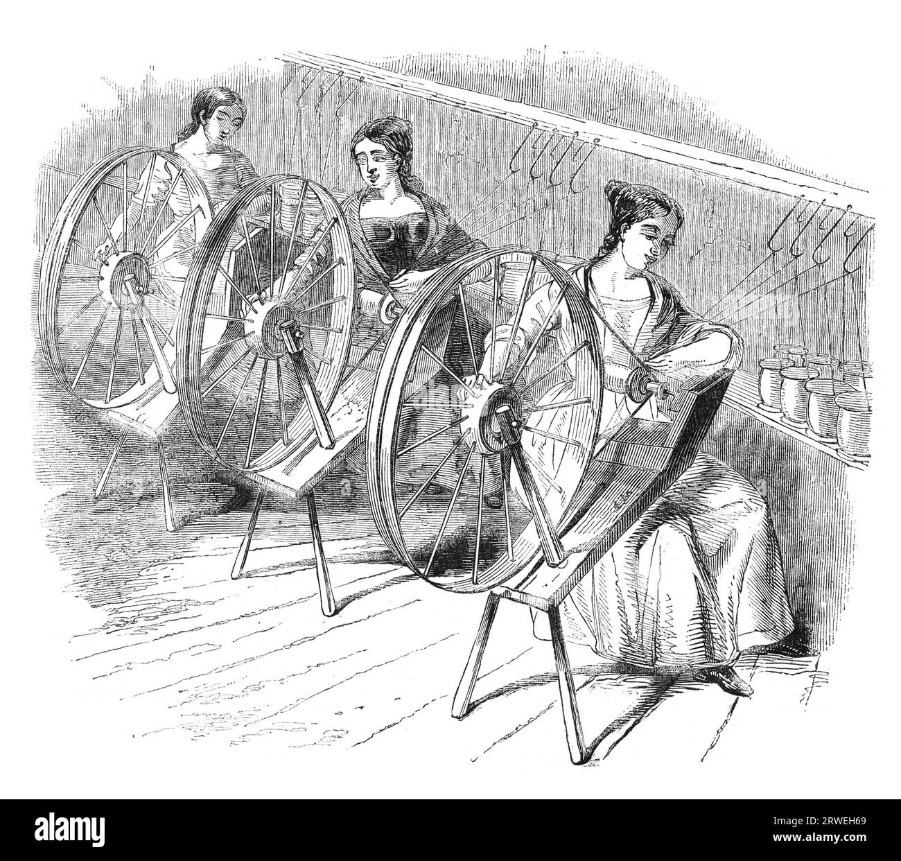 A Day at a Derby silk-mill: Silk-doublers at work. Engraving from a british magazine printed in 1843 Stock Photo