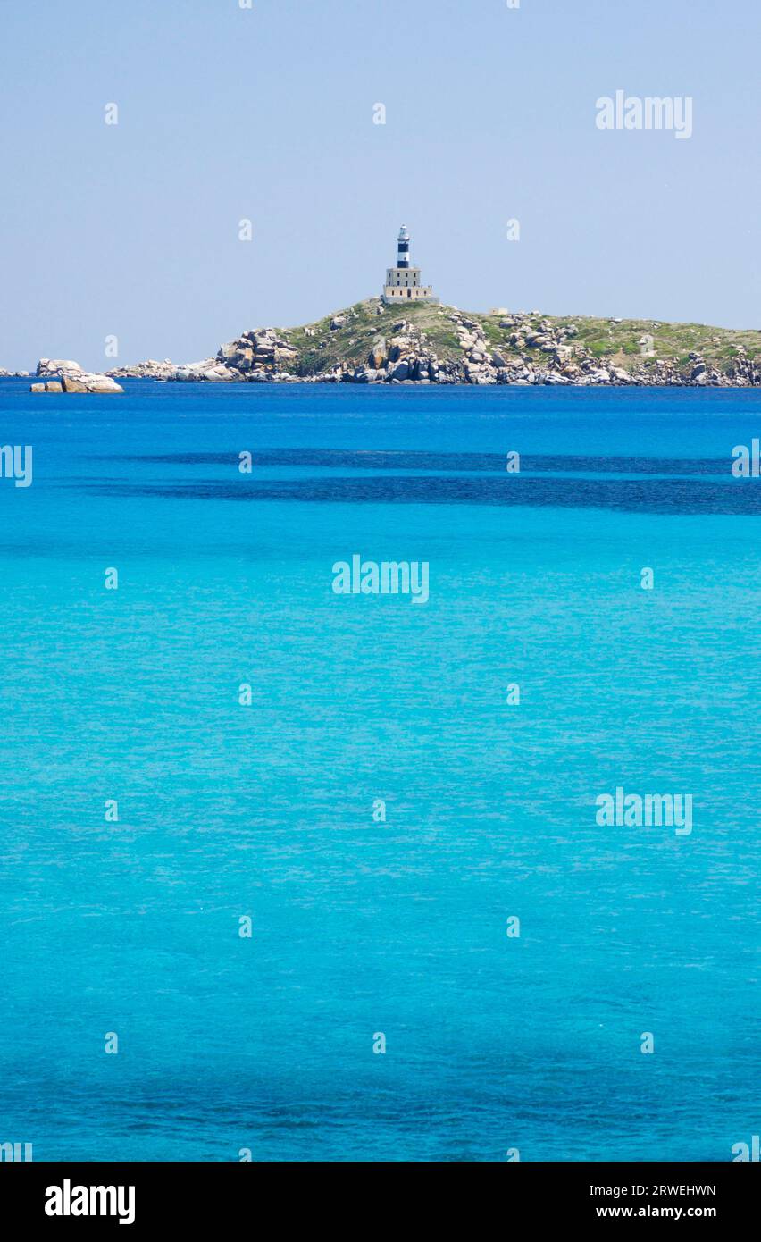 The Isola dei Cavoli with lighthouse near Villasimius Stock Photo