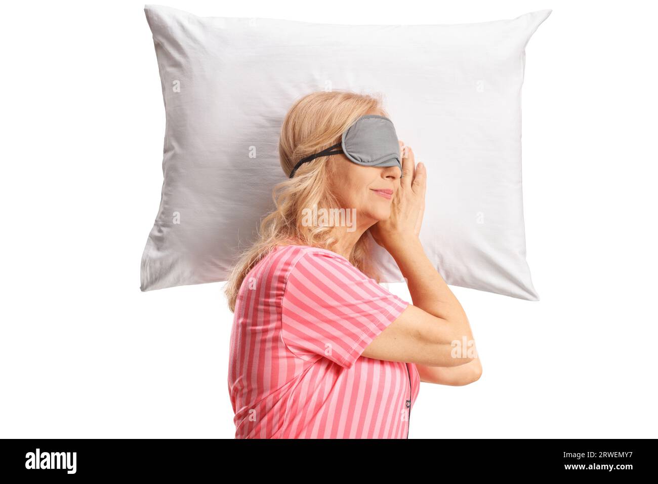 Mature woman in pyjamas sleeping hi-res stock photography and images - Alamy