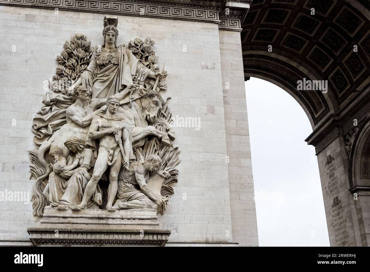 Arc de Triomphe de l'Étoile (Triumphal Arch of the Star), one of the most famous monuments in Paris, France, at the western end of the Champs-Élysées Stock Photo