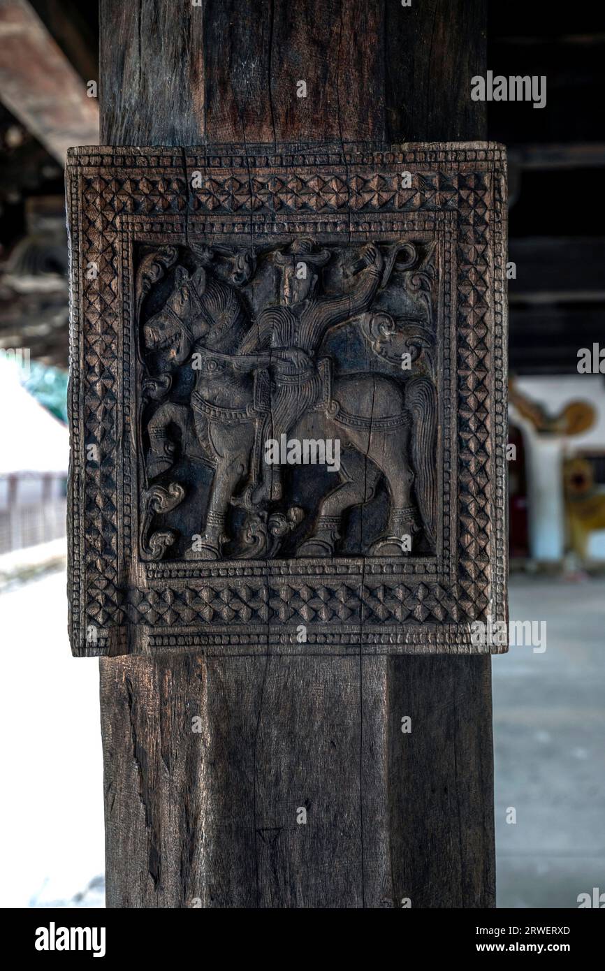 An ancient carving depicting a man riding a horse located on one of the ...