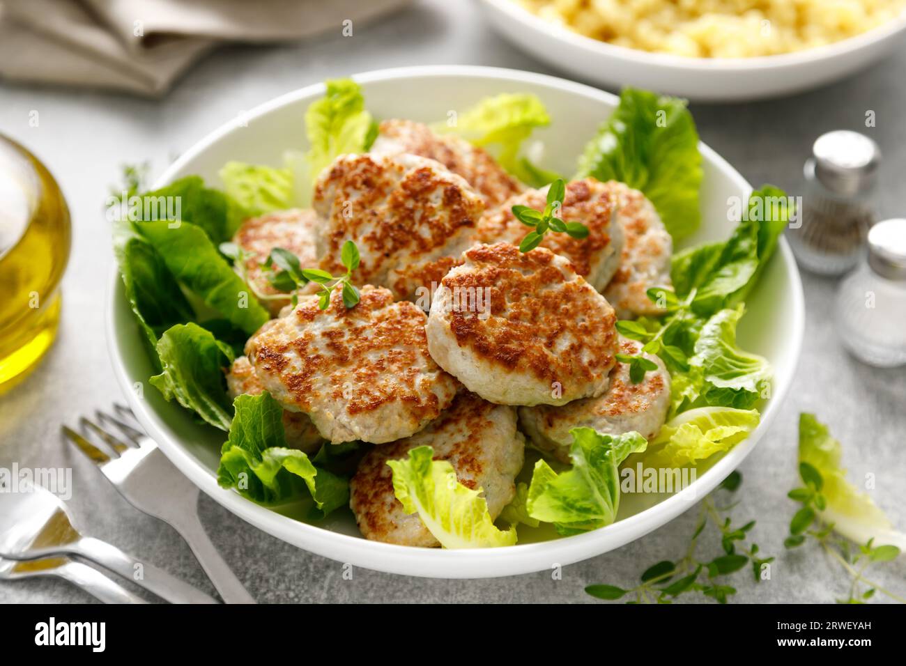 Chicken patties, cutlets with fresh salad Stock Photo