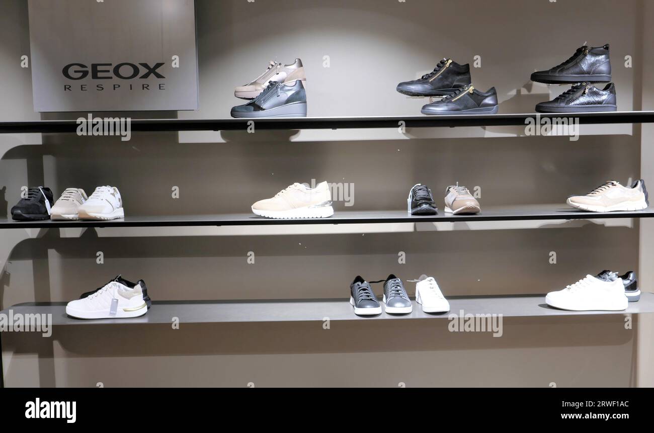 GEOX SHOES ON DISPLAY INSIDE THE FASHION STORE Stock Photo - Alamy