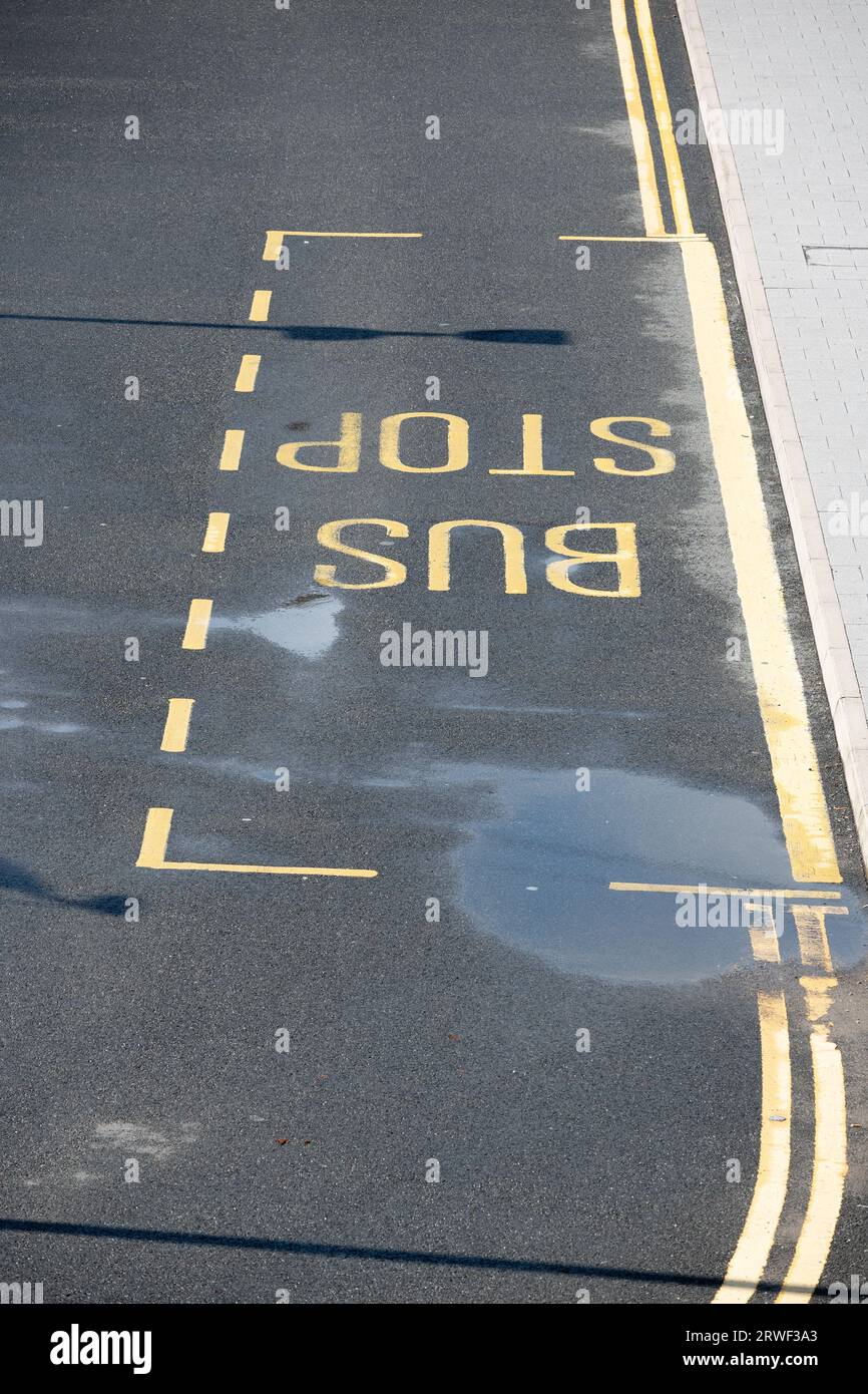 Bus Stop road markings, Kenilworth railway station, Warwickshire, UK