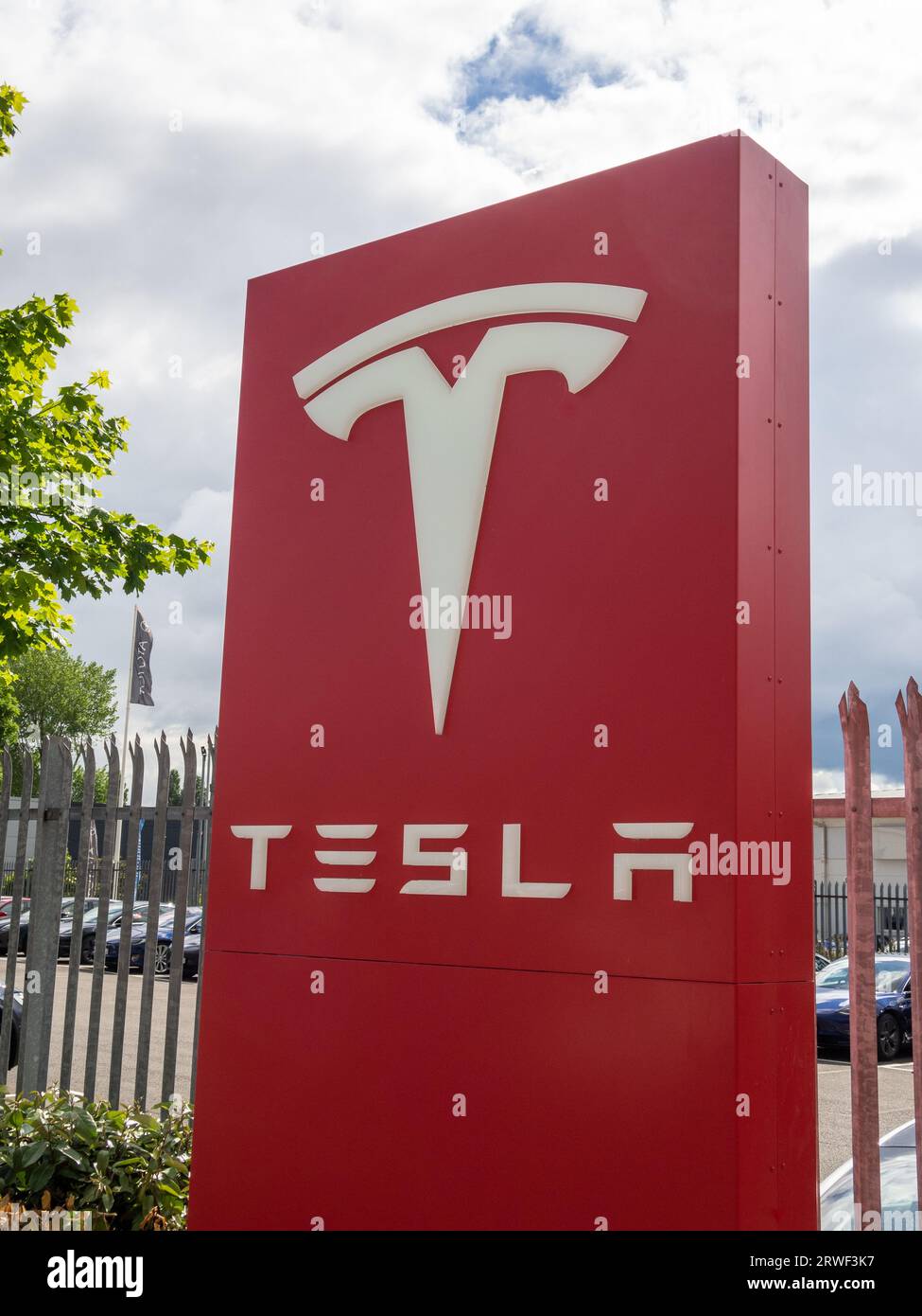 Tesla dealership sign outside a car showroom, Riverside, Retail Park