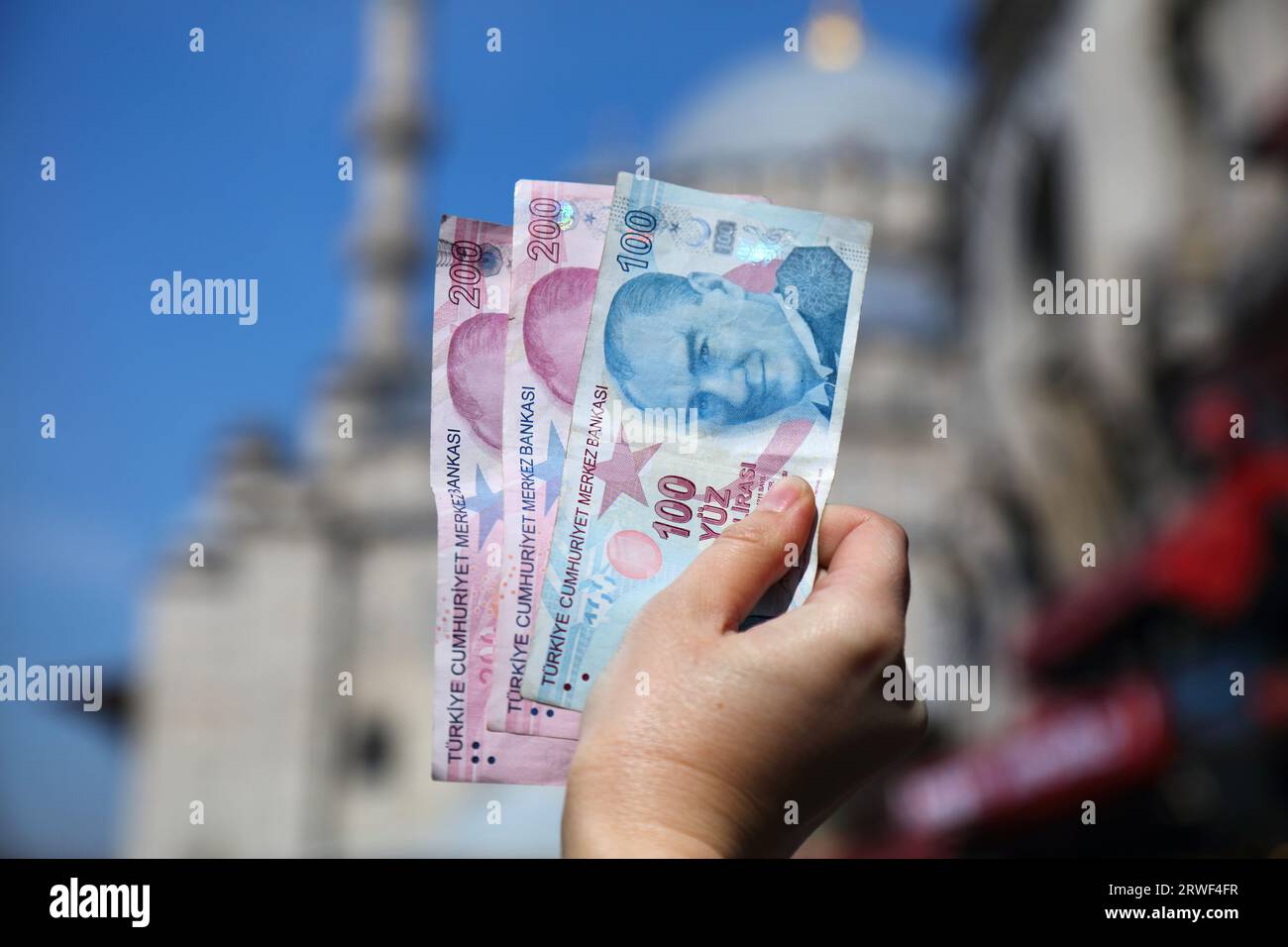 Turkish lira. Currency of Turkey hand holding used banknotes. Turkish