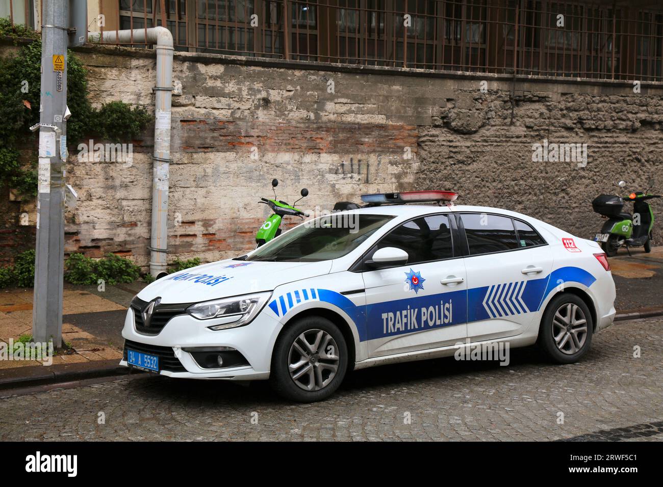ISTANBUL, TURKEY - APRIL 11, 2023: Turkish Traffic Police patrol car, Renault Fluence parked in the street in Istanbul. Stock Photo