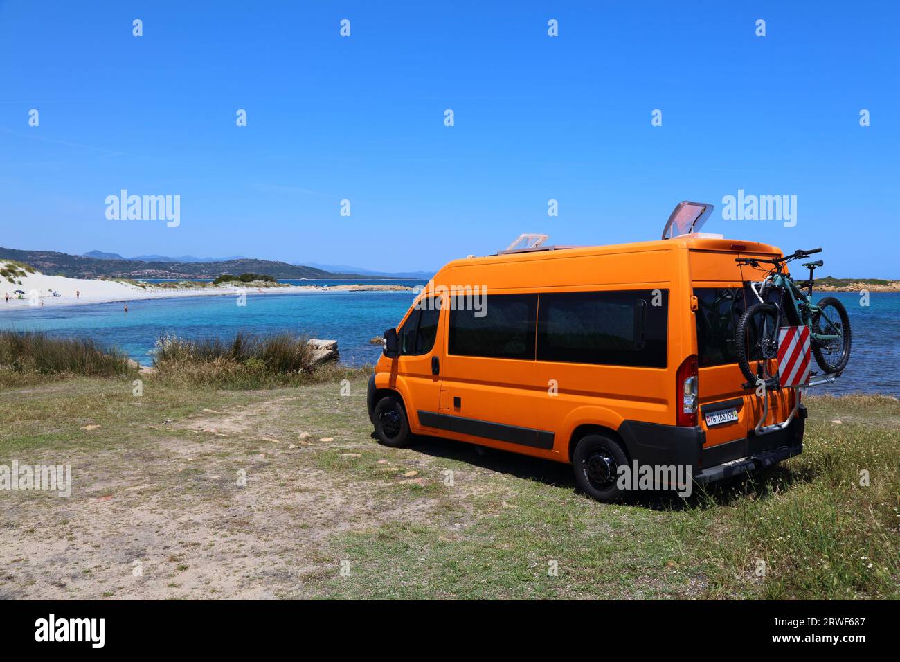 SARDINIA, ITALY - MAY 27, 2023: Home made camper van made from regular Fiat Ducato van parked at Capo Comino in Sardinia. Stock Photo