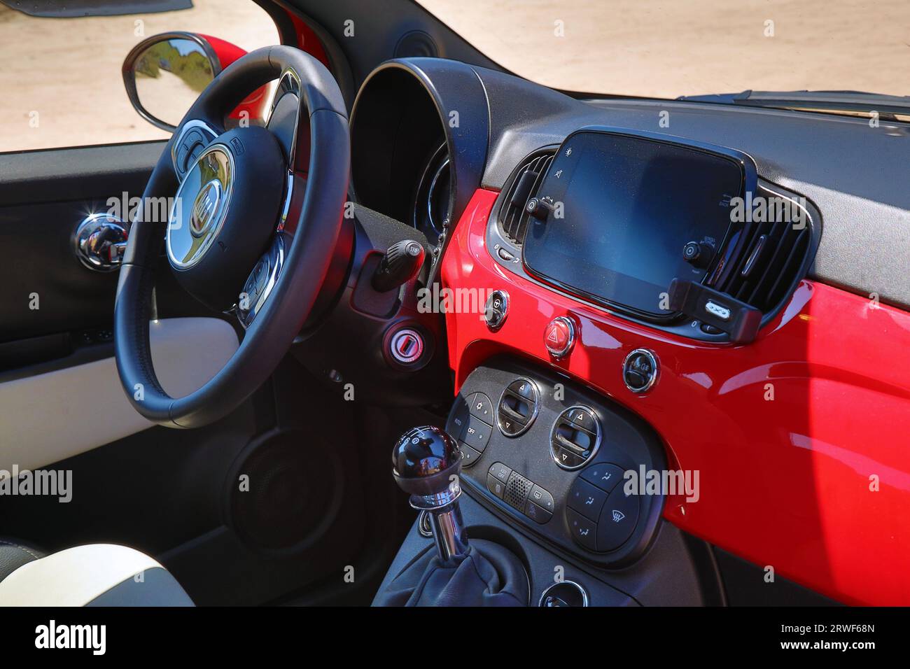 SARDINIA, ITALY - MAY 27, 2023: Steering wheel and dashboard of Fiat 500 Dolcevita, small Italian hatchback car. Stock Photo