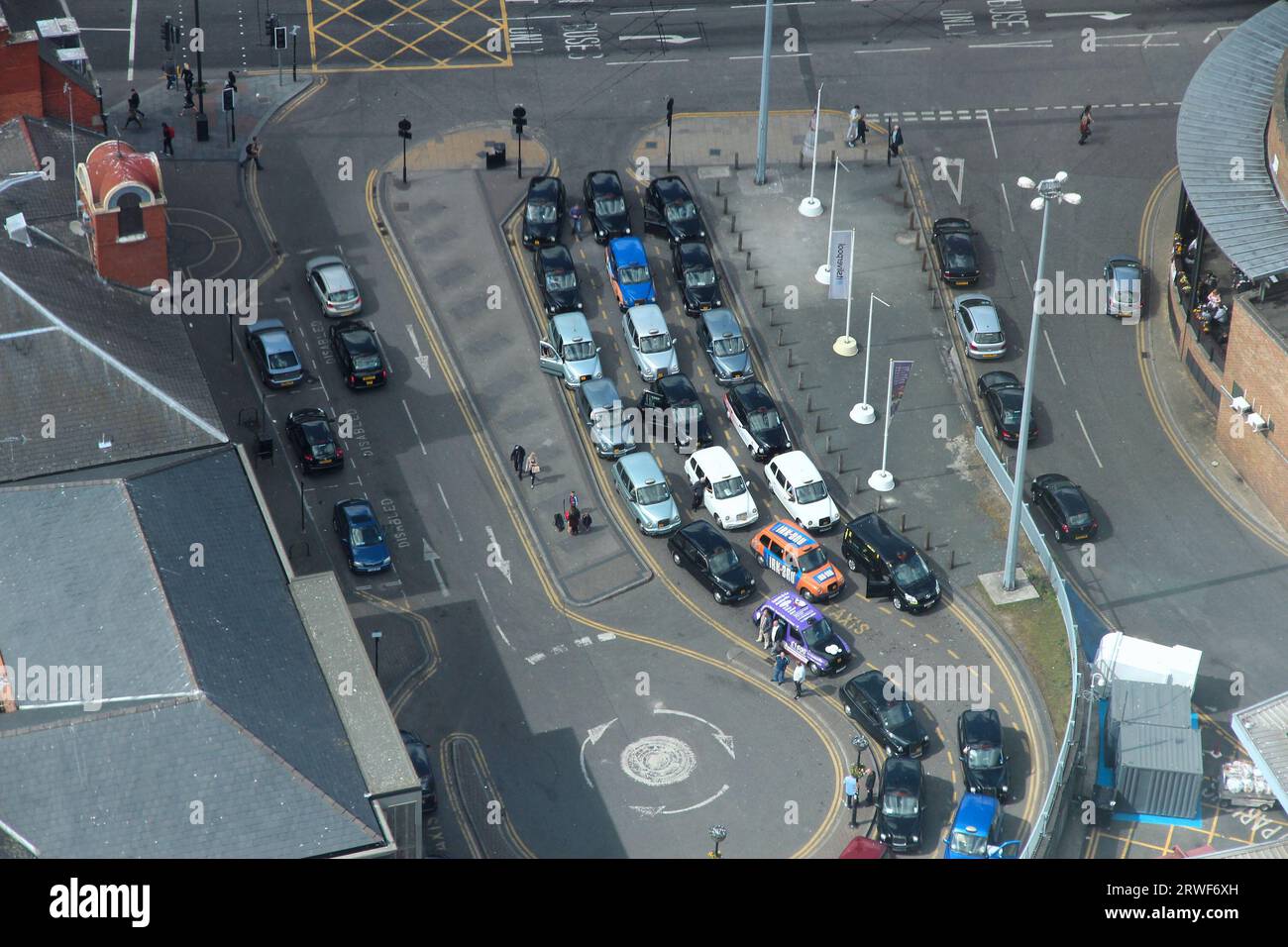LIVERPOOL, UK - APRIL 20, 2013: Public transportation aerial view in Liverpool, UK. Taxi cab stand. Stock Photo