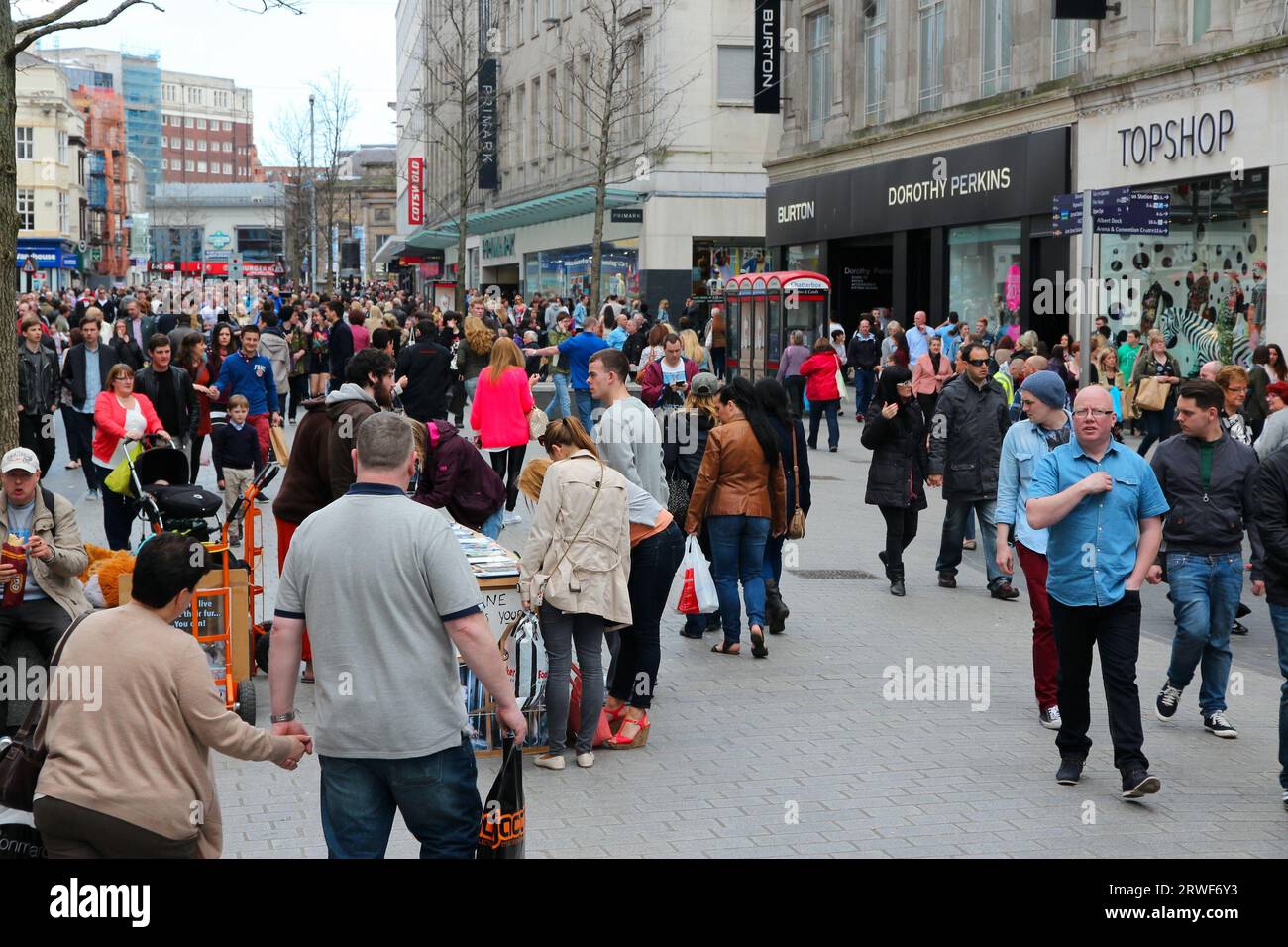 LIVERPOOL, UK - APRIL 20, 2013: People shop at Lord Street, Liverpool, UK. Liverpool City Region has a population of around 1.6 million people and is Stock Photo