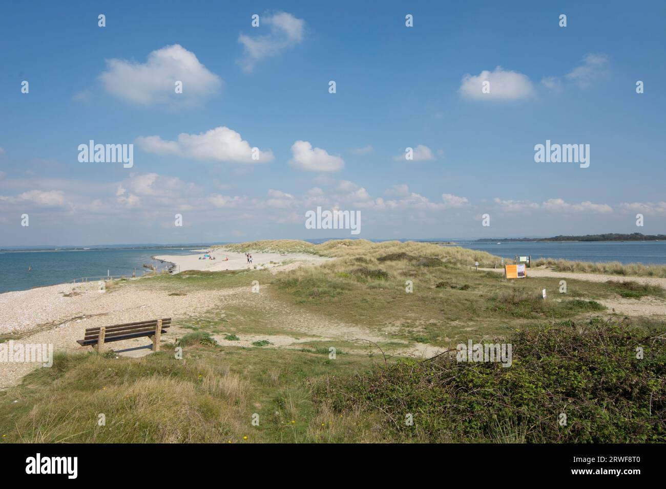 view of East Head peninsular sand dunes, view north into Chichester Harbour from beach end at Wittering, West Sussex, tide in. September Stock Photo