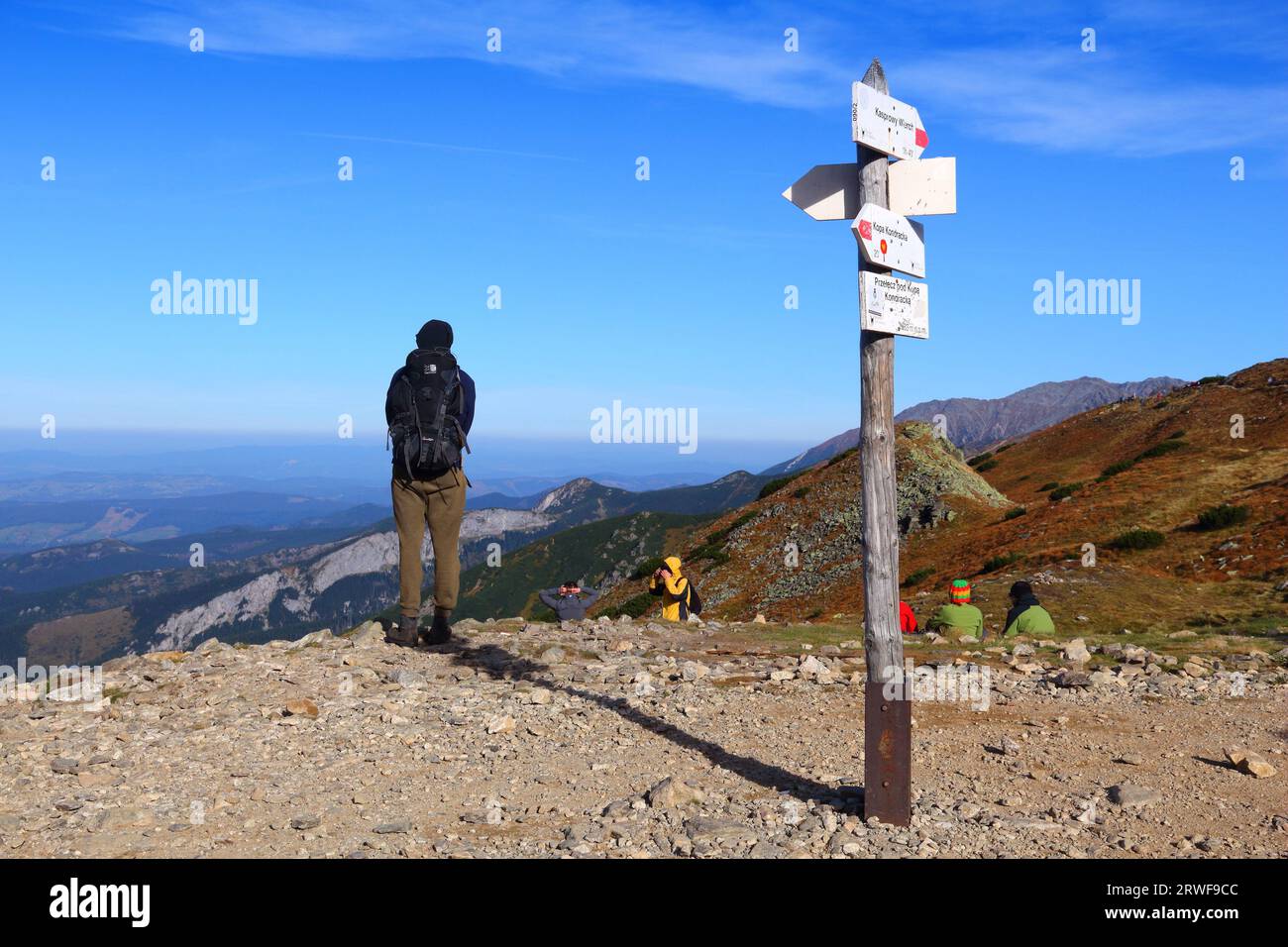 TATRA MOUNTAINS, POLAND - OCTOBER 3, 2015: People hike in Czerwone Wierchy in Tatra Mountains, Poland. Tatra National Park was visited by 2.7 million Stock Photo