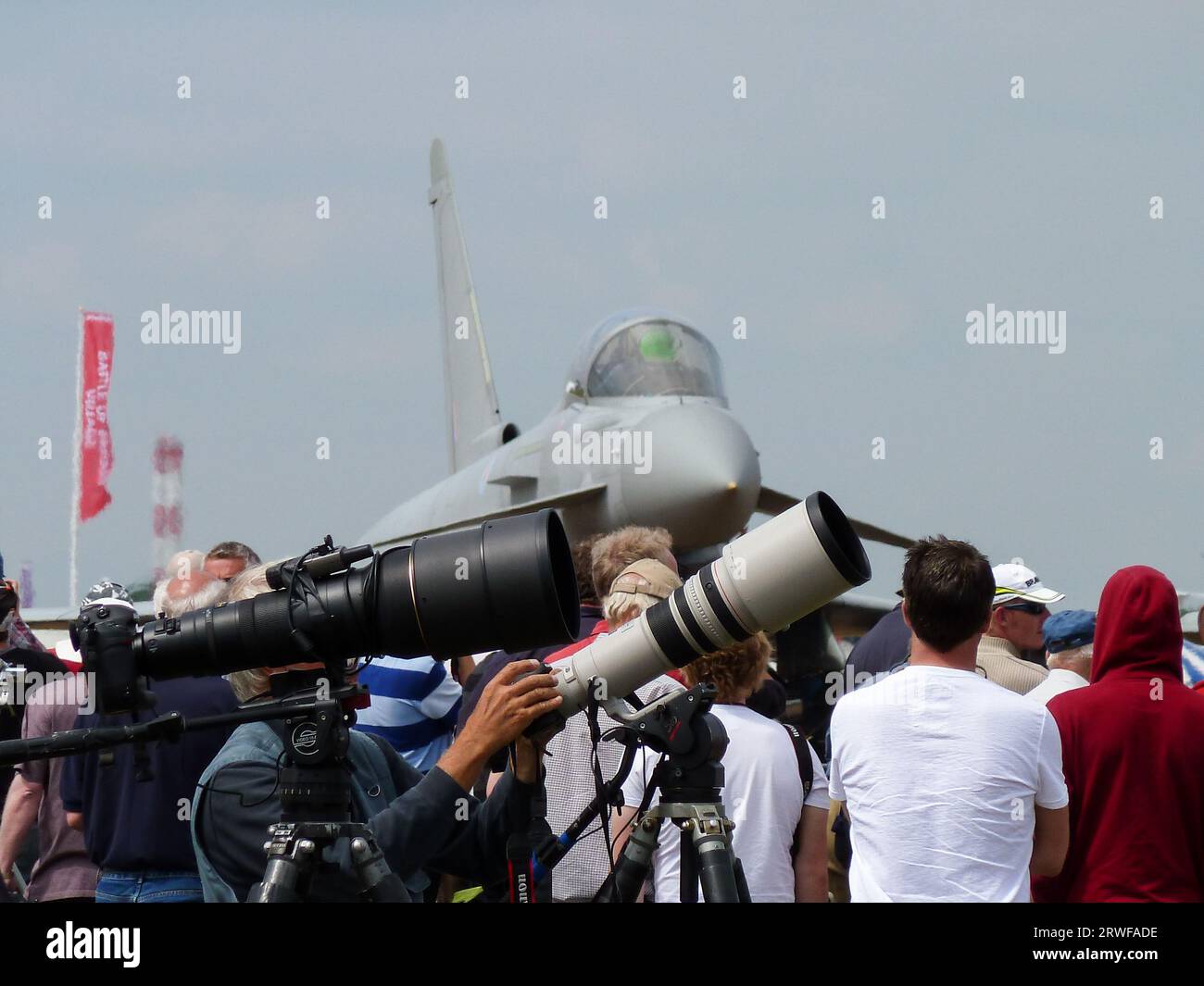 Long zoom cameras belonging to aviation photographers at the Royal International Air Tattoo airshow, RAF Fairford, UK. Typhoon fighter jet plane Stock Photo