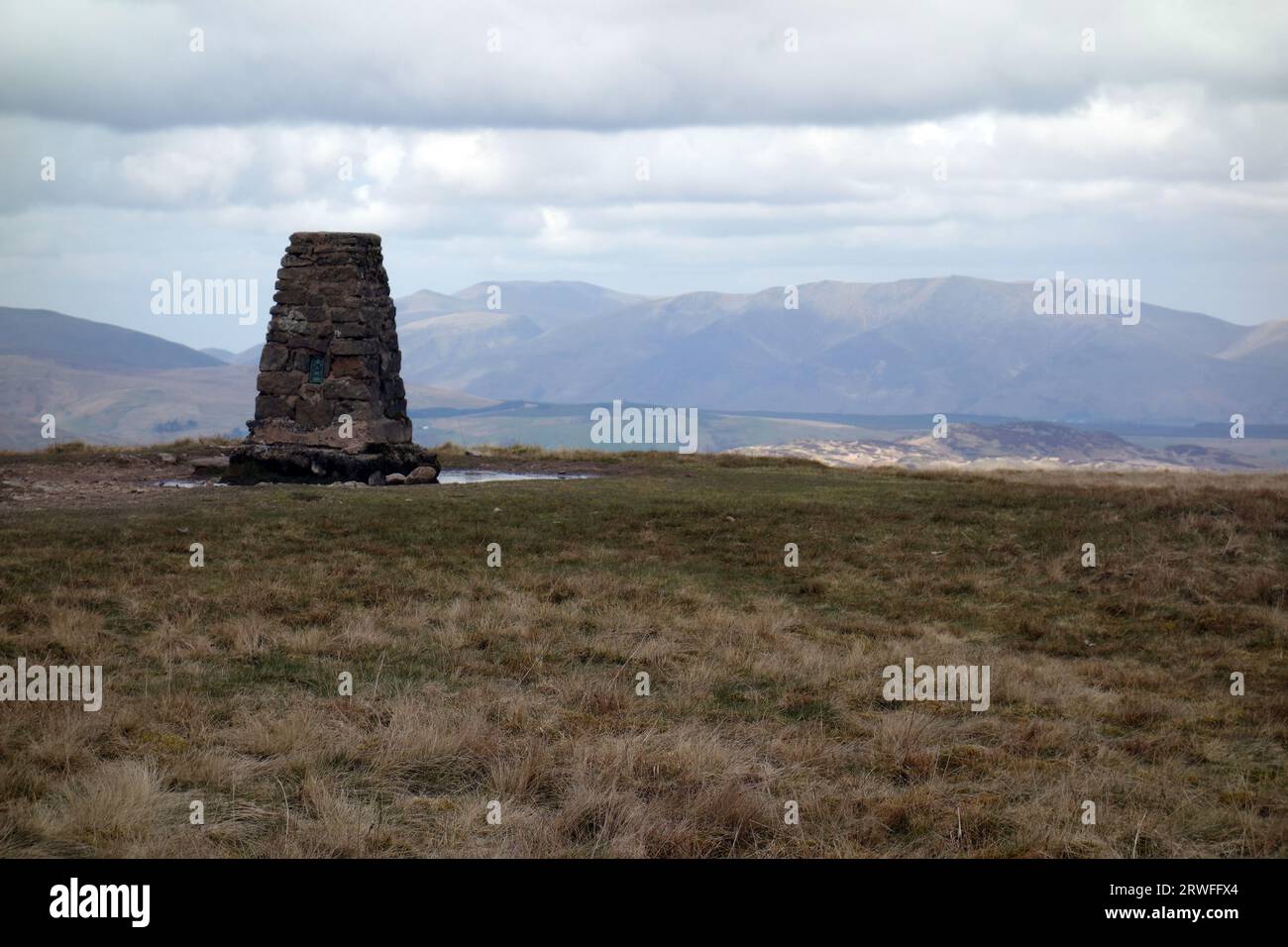The Stone Trig Point on the Summit of the Wainwright 'Loadpot Hill' in the Lake District National Park, Cumbria, England, UK Stock Photo