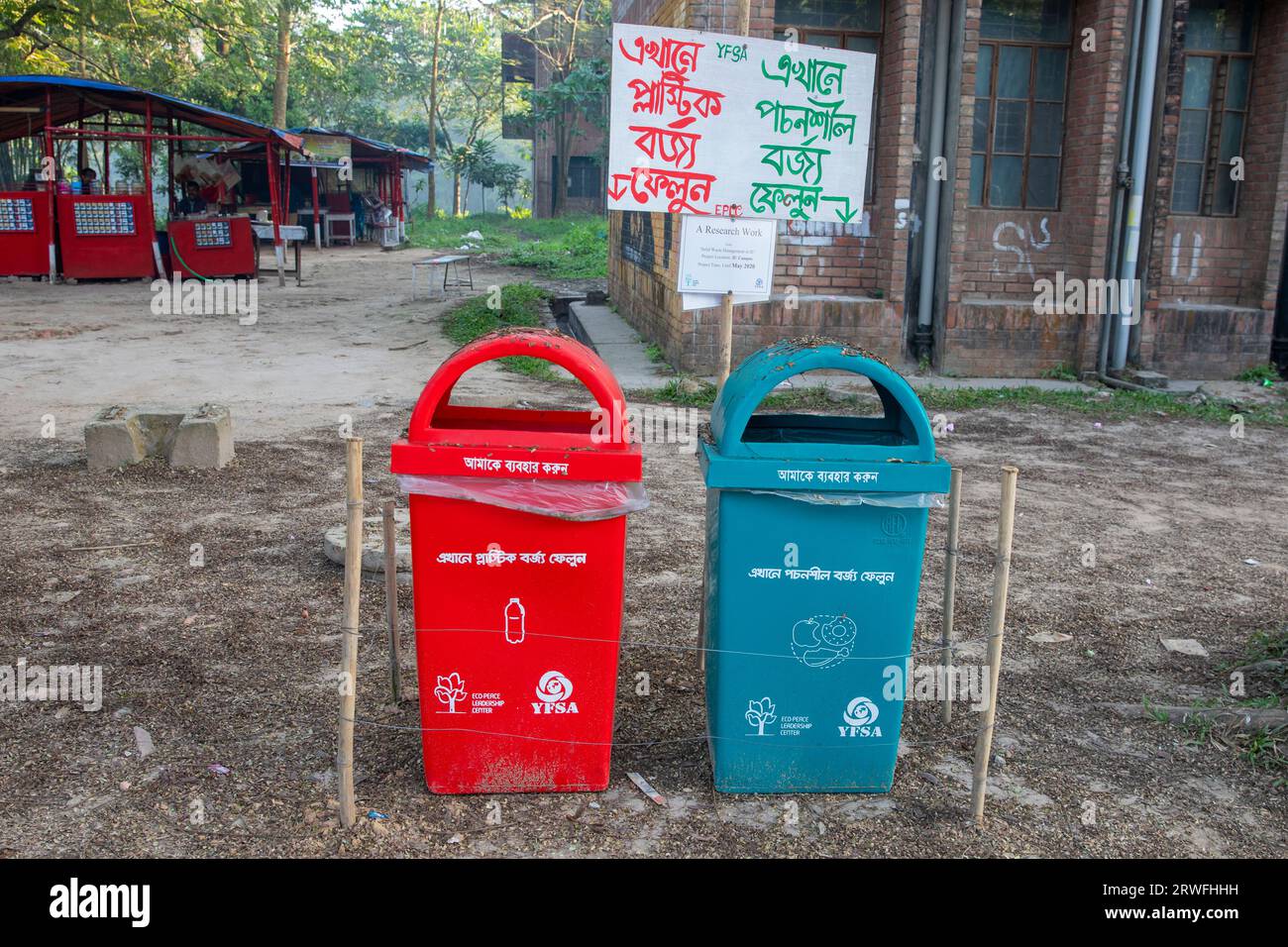 Red and blue garbage trash bin. Selective focus separator different
