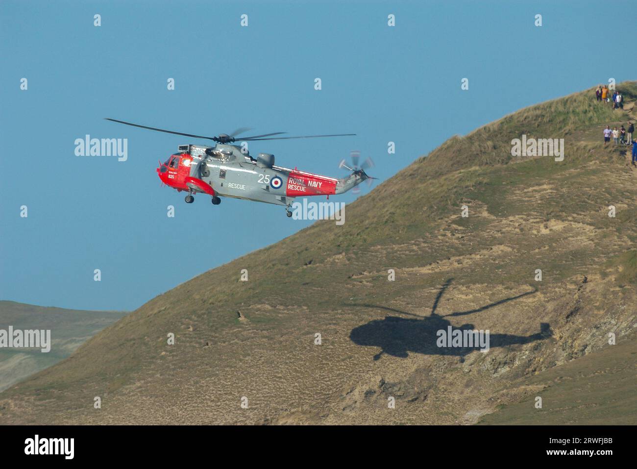 Rescue of two men cut off by incoming tide near Perranporth & forced to ...