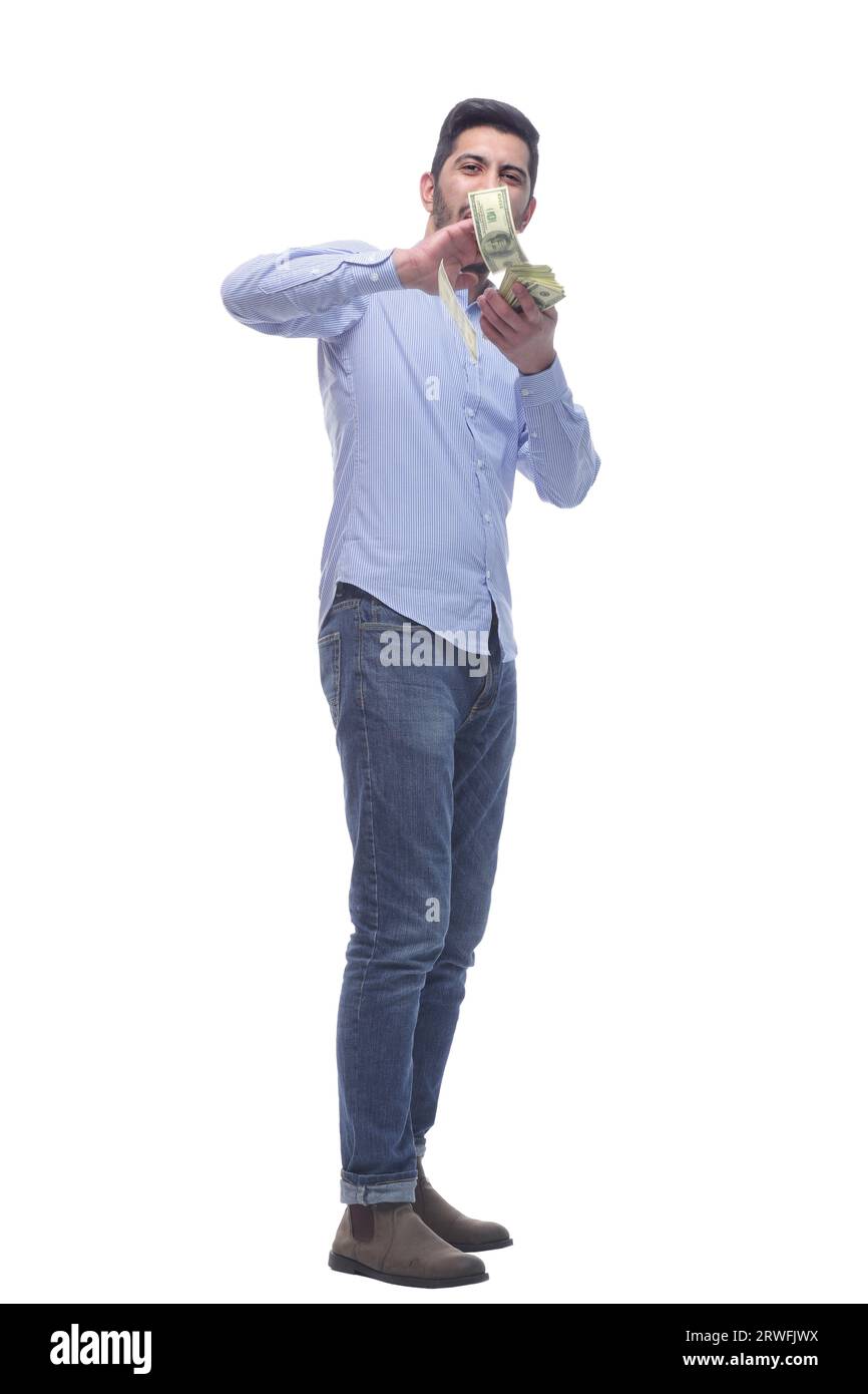 in full growth. happy man with a fan of dollar bills Stock Photo - Alamy