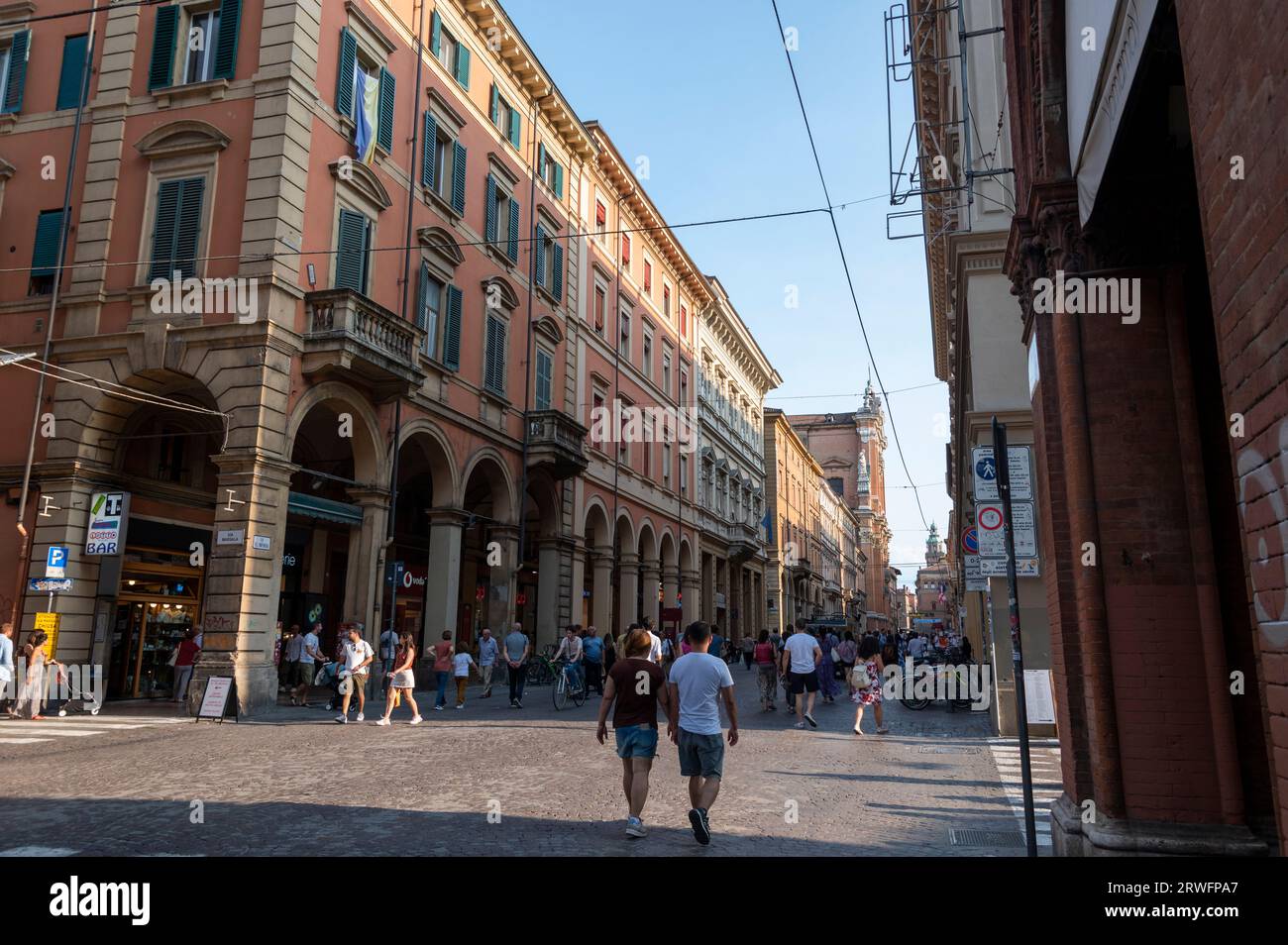 Shoppers are able to enjoy shopping on Via dell'Indipendenza in safety as the one kilometre long straight Avenue is closed to traffic on weekends in B Stock Photo