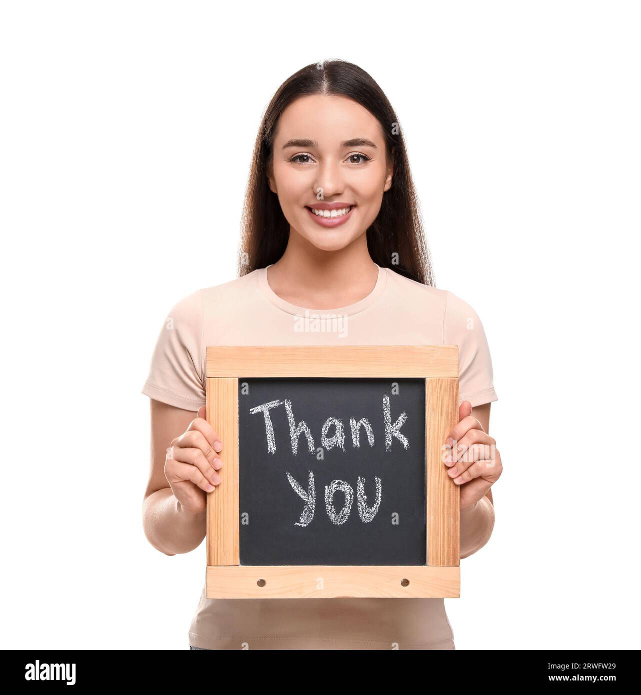 Happy woman holding small chalkboard with phrase Thank You on white ...