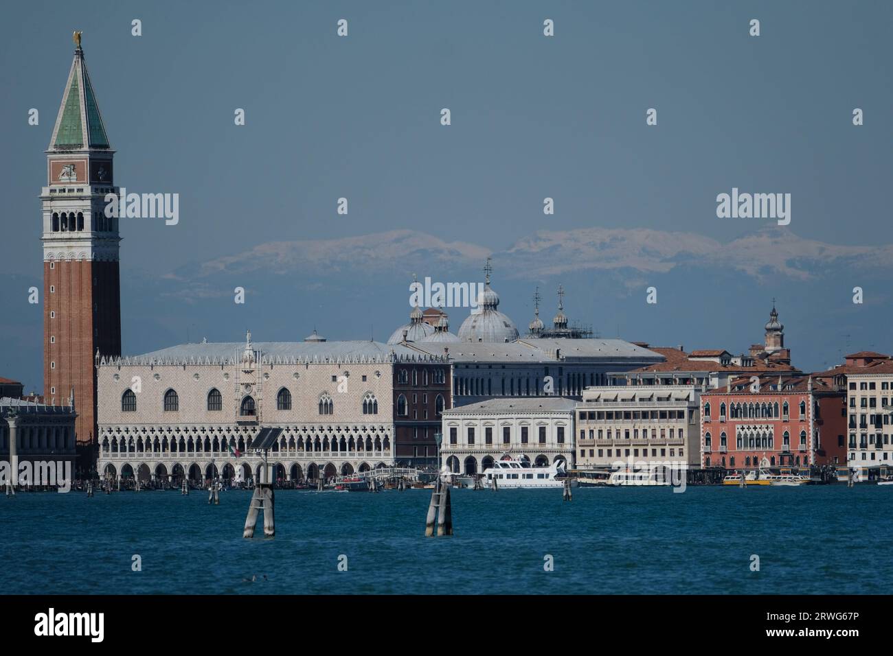 A view of the city of Venice with the Dolomites in the background Stock Photo