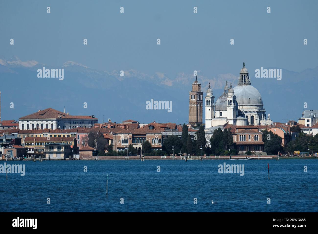 A view of the city of Venice with the Dolomites in the background Stock Photo