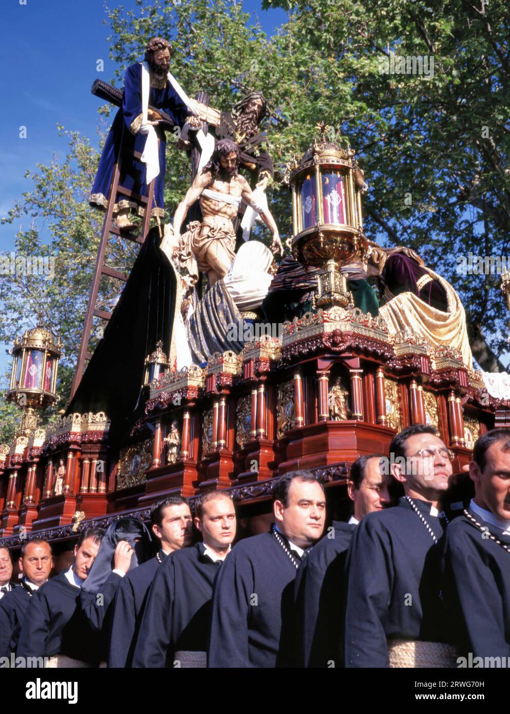 MALAGA, SPAIN – APRIL 08, 2023 Catholic processions in the streets of Malaga during the Semana Santa. The Holy Week is the annual tribute of the Passi Stock Photo