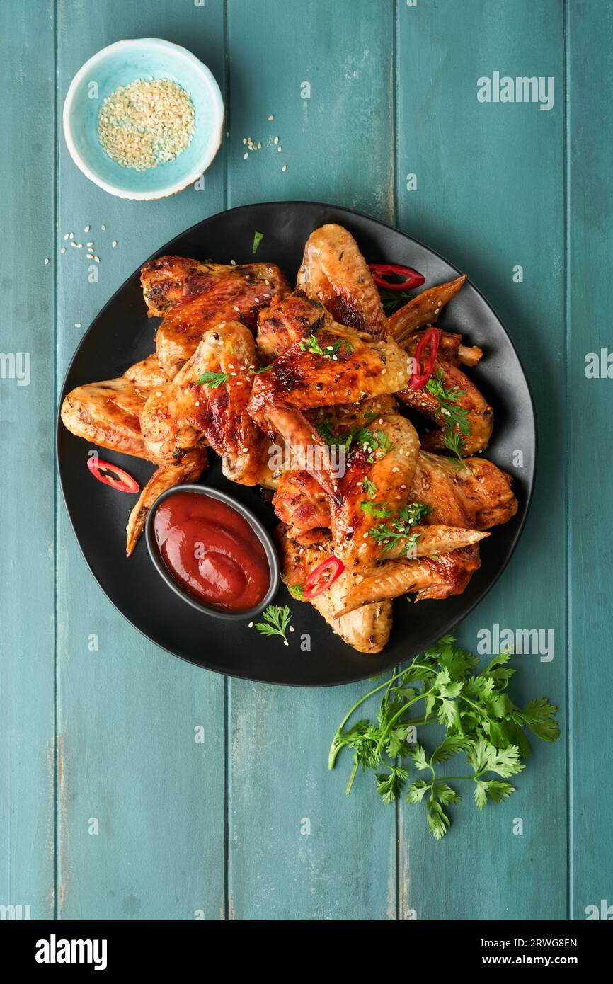 Chicken wings. Grilled or baked chicken wings with sesame seeds and