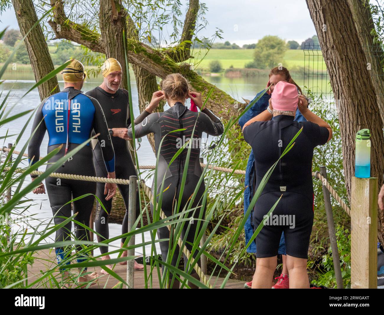 Pickmere, Knutsford, Cheshire, UK. September 14th 2023. Swimmers preparing for end of the season wild water swimming One or Two mile race on Pickmere Stock Photo