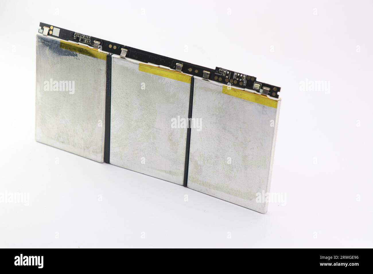 Lithium polymer battery arranged in an order kept on a white background. Modern laptops are powered by li-po battery Stock Photo