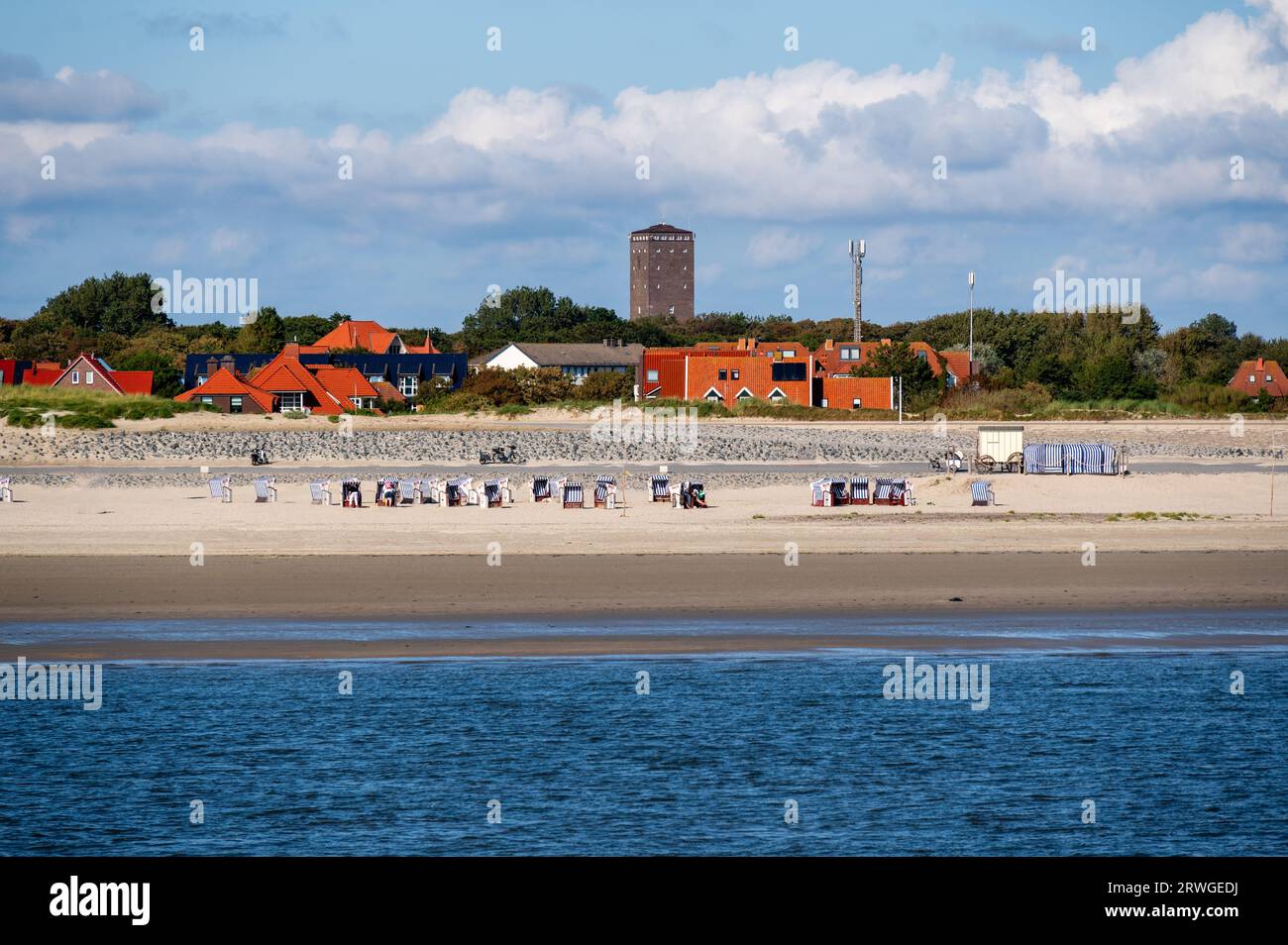 The water tower behind the beach on the North Sea island of Norderney Stock Photo