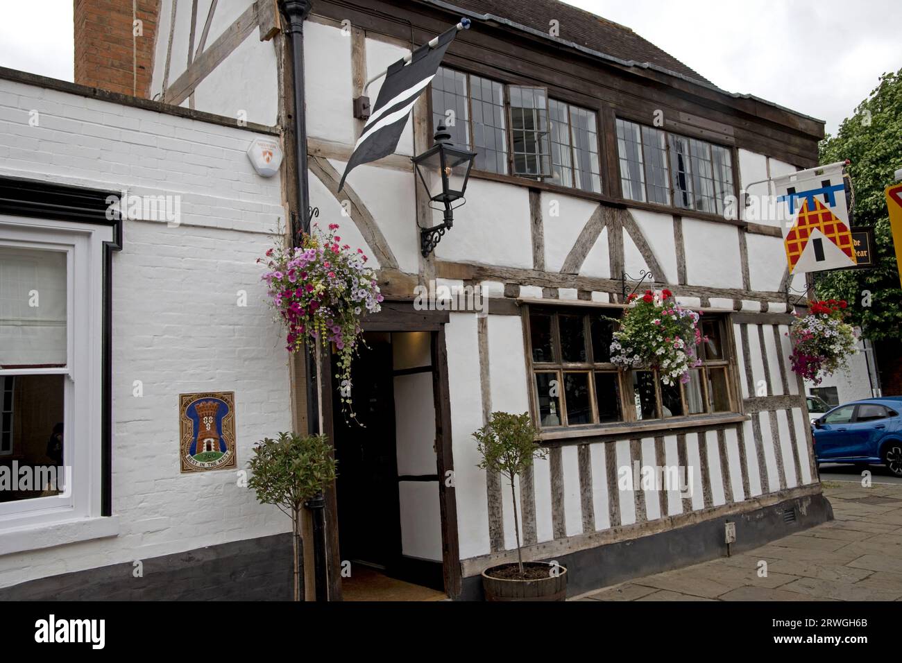 The origin of Ye Olde Black Bear public house at the junction of High Street and Mythe Road Tewkesbury is believed to go back to 1308. It has recently Stock Photo