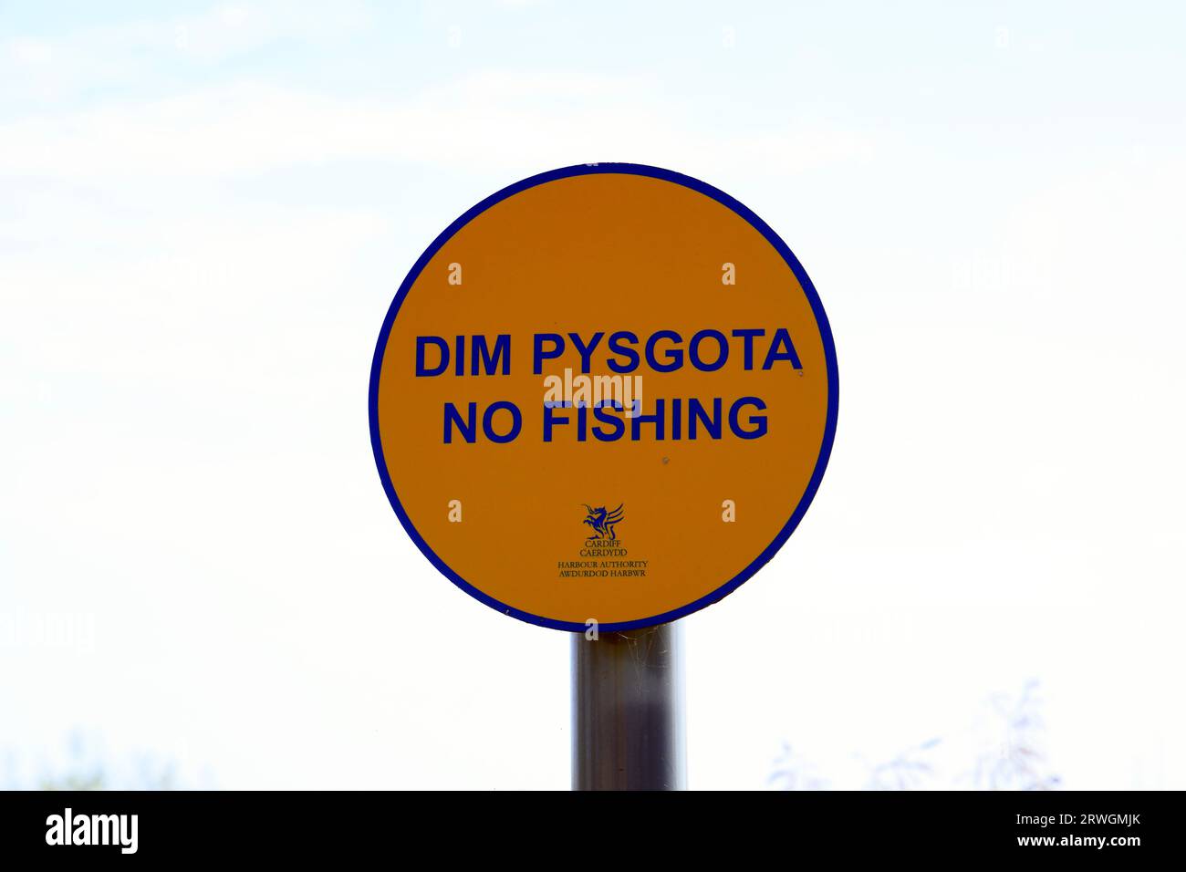 No fishing sign in English and Welsh, Cardiff Bay, Cardiff, Wales. Stock Photo