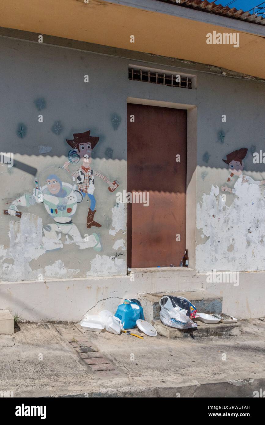 Abandoned building in Puerto Rico featuring Toy Story characters Woody, Buzz Lightyear, and Jessie.  Photo by Liz Roll Stock Photo