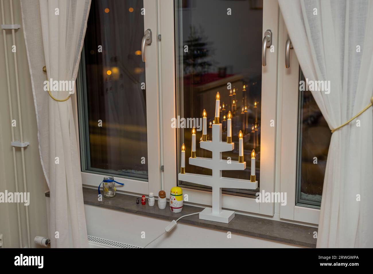 Closeup view of window interior with traditional Swedish decoration