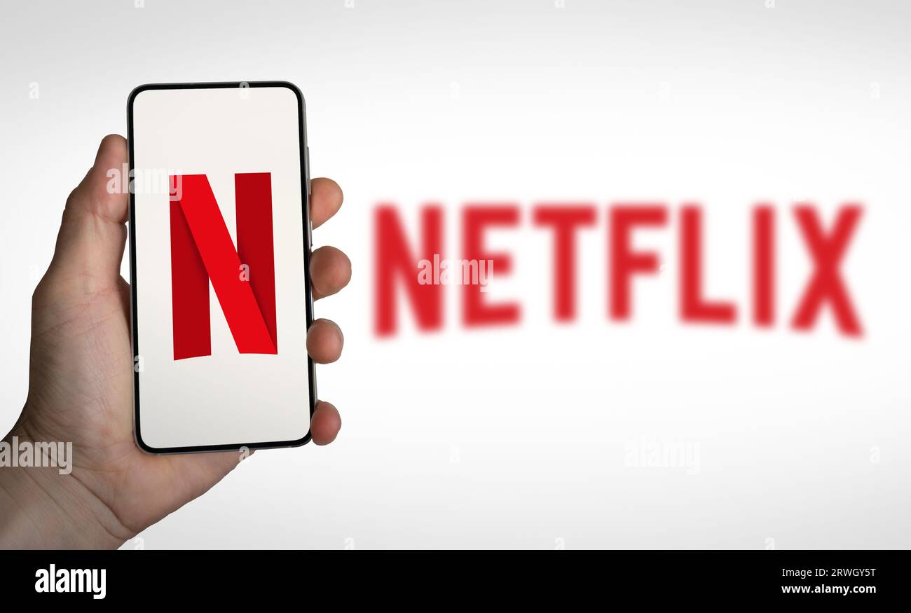 Netflix - subscription based streaming service displayed on smartphone Stock Photo