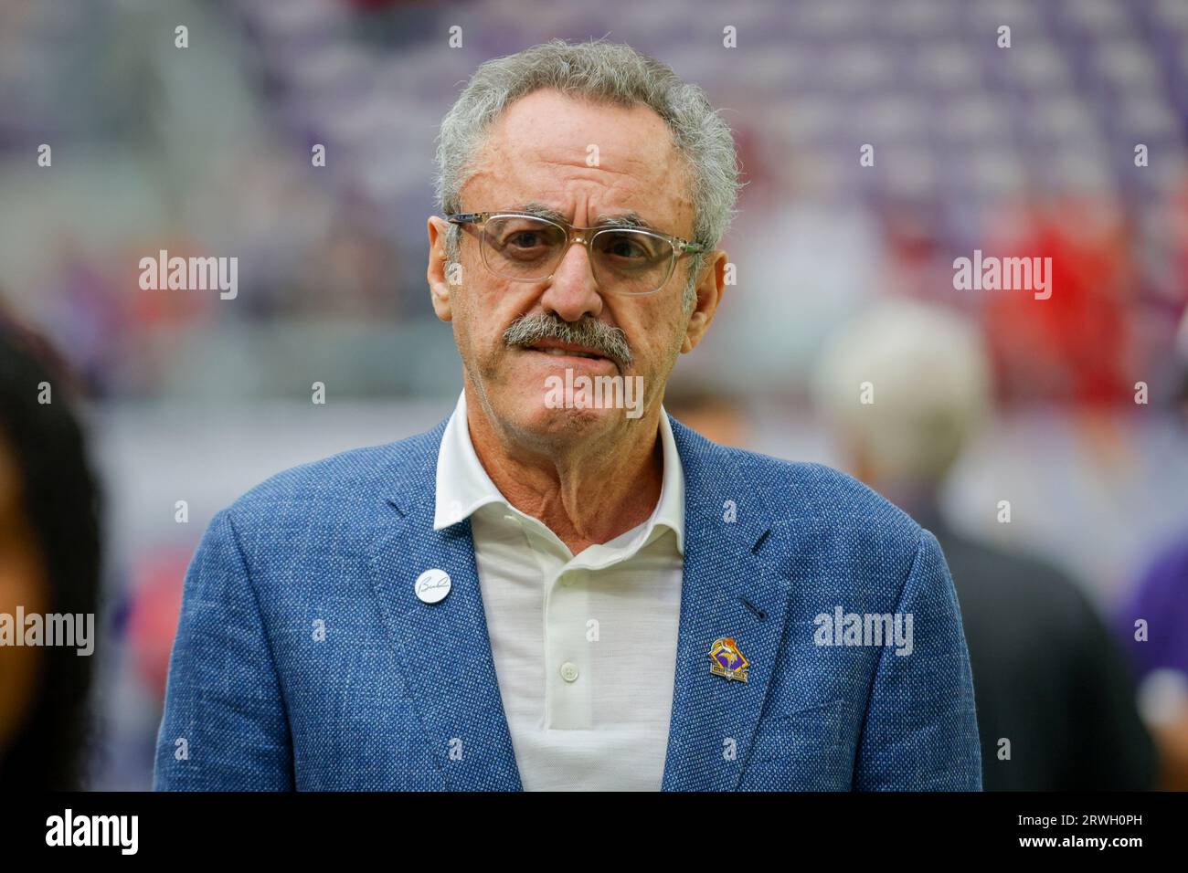 Minnesota Vikings owner Zygi Wilf walks on the field before an NFL