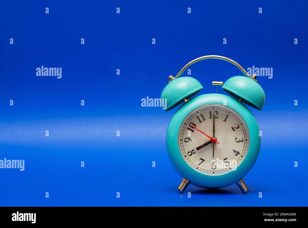 Vintage blue alarm clock hi-res stock photography and images - Alamy