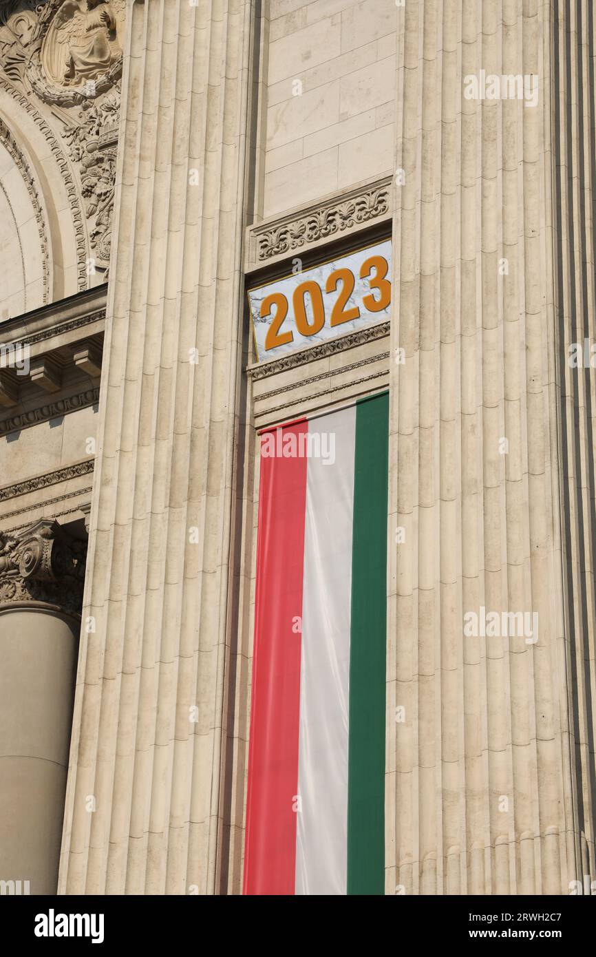 big text 2023 with the very long red white green flag of hungary during the celebration Stock Photo