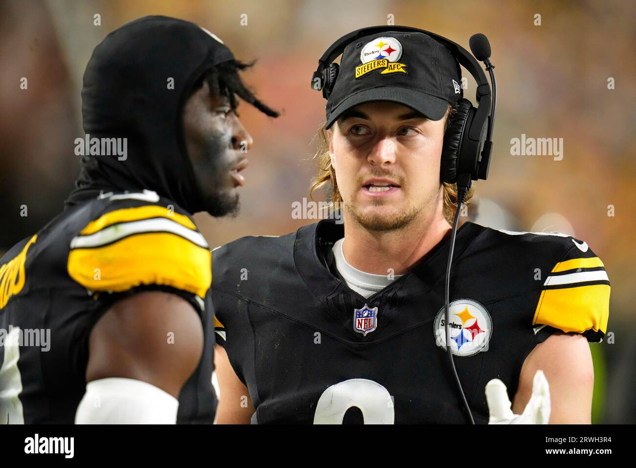 Pittsburgh Steelers quarterback Kenny Pickett, right, talks with wide ...