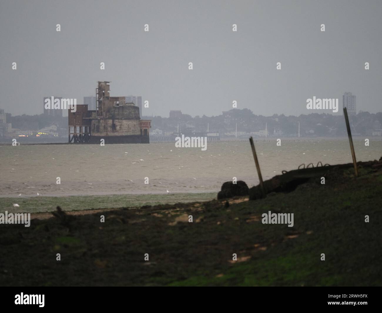 Sheerness, Kent, UK. 19th Sep, 2023. Unique property 'No 1 The Thames' is to be sold at auction by Savills tomorrow guide price £150,000, otherwise known as Grain Tower - a mid 19century gun tower set off the Isle of Grain, at the mouth of the Medway and opposite the Port of Sheerness. The tower pictured from Queenborough this evening. Credit: James Bell/Alamy Live News Stock Photo